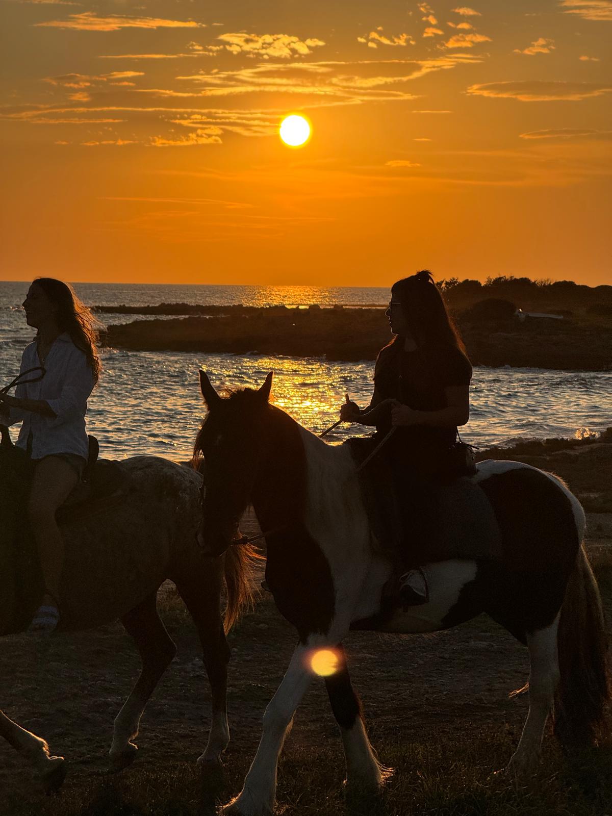 Passeggiata a cavallo al tramonto sulle spiagge di Punta Prosciutto